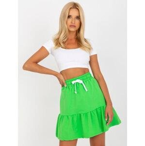 Fashionhunters Světle zelená krátká mikinová sukně s vázačkou Velikost: L / XL