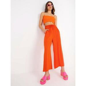 Fashionhunters Dámské oranžové viskózové kalhoty SUBLEVEL Velikost: XS