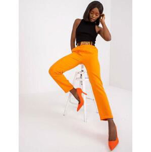 Fashionhunters Zářivě oranžové oblekové kalhoty s ozdobným páskem Sevilla Velikost: 2XL, XXL