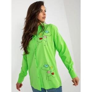 Fashionhunters Světle zelené oversize tričko s potiskem Velikost: S