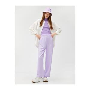 Koton The Wide Leg Trousers have an elasticated waist and relaxed fit.