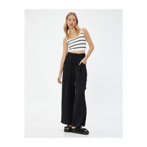 Koton Cargo Pants with an elasticized waist, wide legs, pockets, textured.