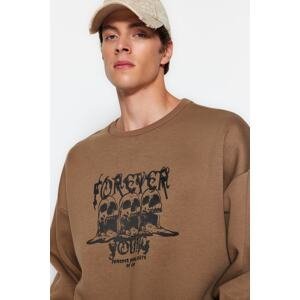 Trendyol Brown Men's Oversize/Wide-Fit Crew Neck Fluffy Printed Sweatshirt.