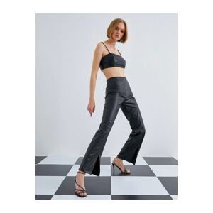 Koton Leather Look Trousers with Slit Detail.