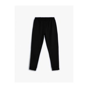 Koton Sports Sweatpants with Elastic Waist, Pockets and Stitching Detail