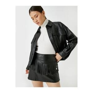 Koton Leather Look Mini Skirt with Tassel Detail.