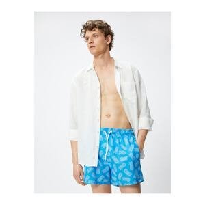 Koton Short Marine Shorts with Pineapple Print. A drawstring waist with pocket.
