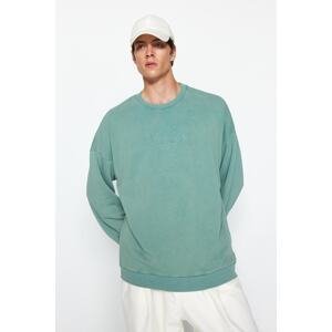 Trendyol Men's Green Oversize/Wide-Fit Anti-aging/Faded-effect Text and Embroidery Cotton Sweatshirt.