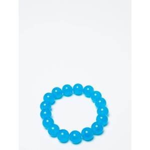 Bracelet of pearls on an azure elastic band