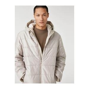 Koton Basic Down Jacket with a Hooded Pocket Detailed Zipper.