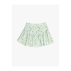 Koton Shorts with a skirt with floral ruffles and an elasticated waist with a ribbed waist.