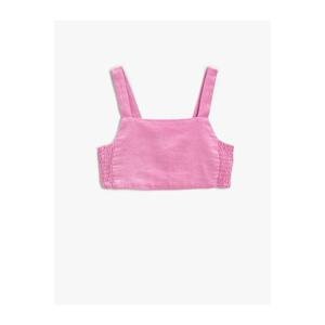 Koton A crop top with thick straps and a window detail in the back with elastication.