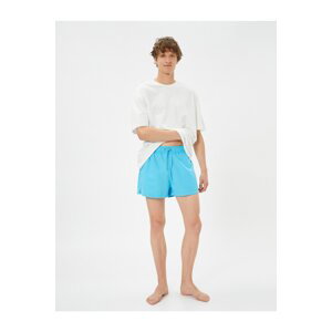 Koton Short Marine Shorts with a tie-waist pocket detail.