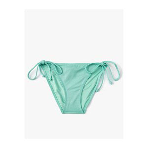 Koton Textured Bikini Bottoms Normal Waist Tie Detail on the sides.