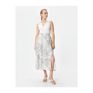 Koton Melis Ağazat X Cotton - Floral Midi Skirt with a slit and pockets.