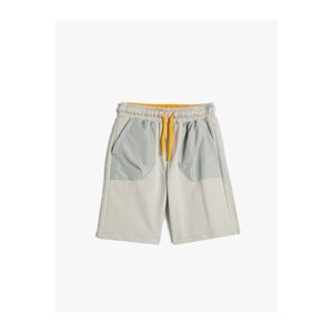Koton Shorts with Tie Waist, Pockets, Parachute Fabric Detailed with Cotton.