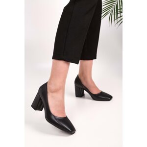 Shoeberry Women's Lax Black Skin Heeled Shoes