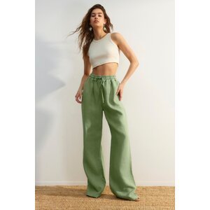 Trendyol Green 100% lněné kalhoty s vysokým pasem a širokými nohavicemi s elastickým pasem.
