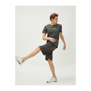 Koton Sports Shorts with Lace-Up Waist and Pocket.
