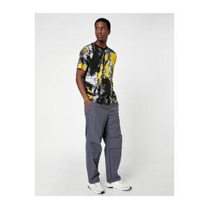 Koton Parachute Trousers with a loose fit, lacing at the waist, and elasticated legs with a pocket detail.