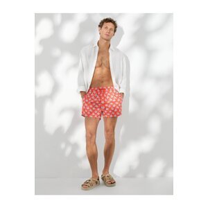 Koton Beach Shorts with a palm print, drawstring waist and pockets.